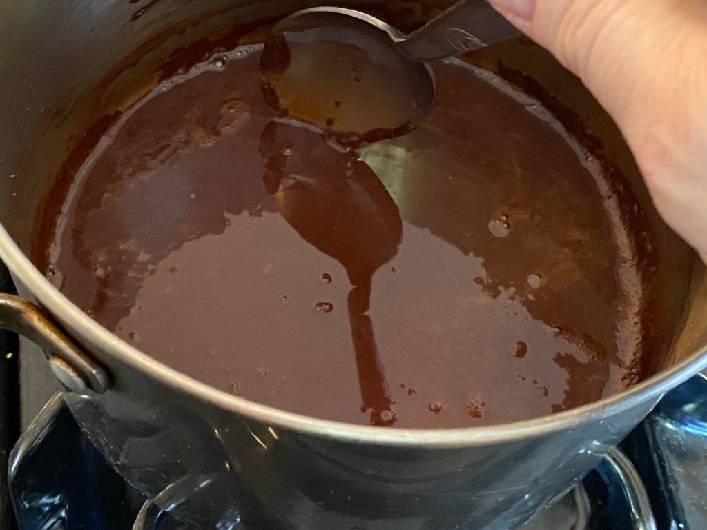mixing Truvia, cocoa and water