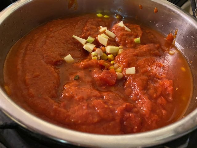 Adding Marinara Sauce