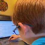 Kid on computer