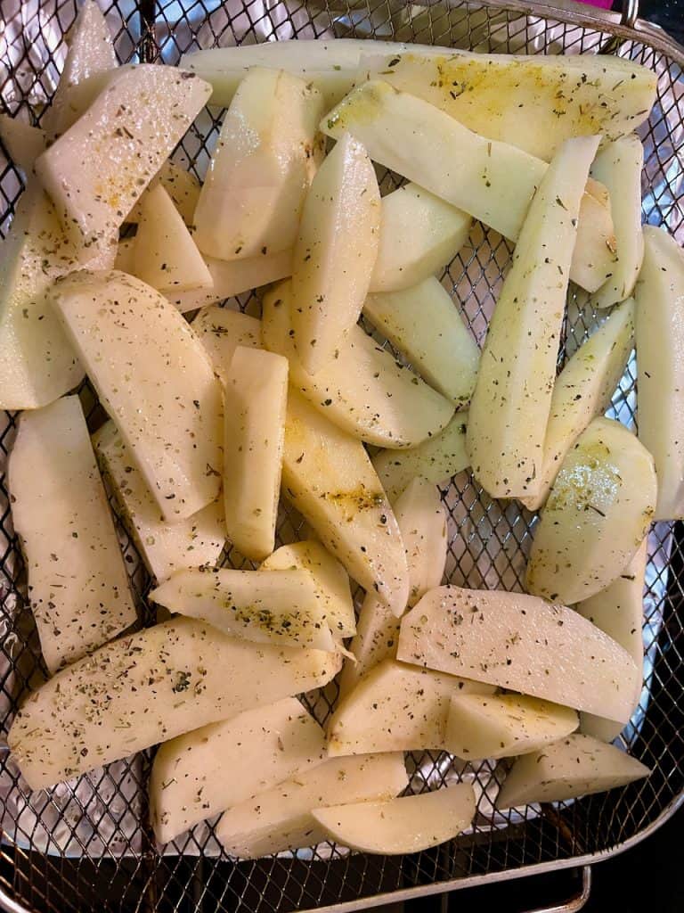 raw fries in basket