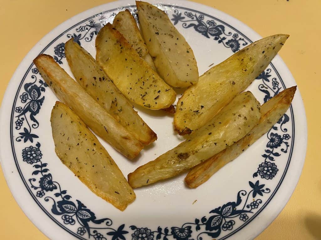 Cooked steak fries on a plate