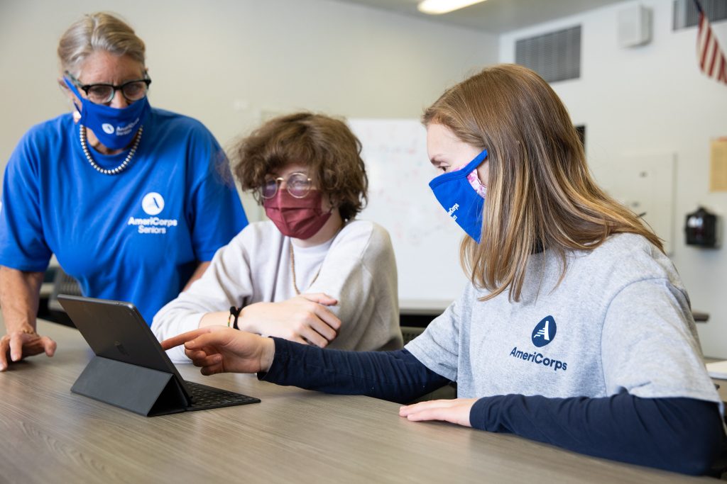 Two women with a student - Courtesy of AmeriCorps